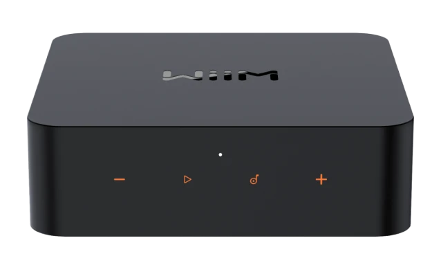 Front view of WiiM Pro with the WiiM logo on the top panel and orange touch controls for volume, playback, and presets
